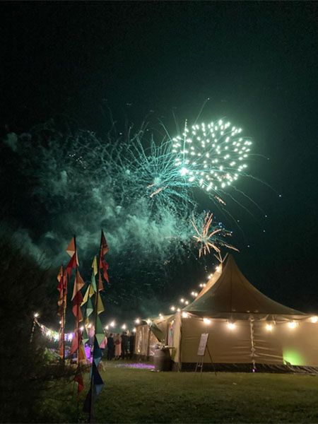 Fireworks above marquee at Beacon Crag